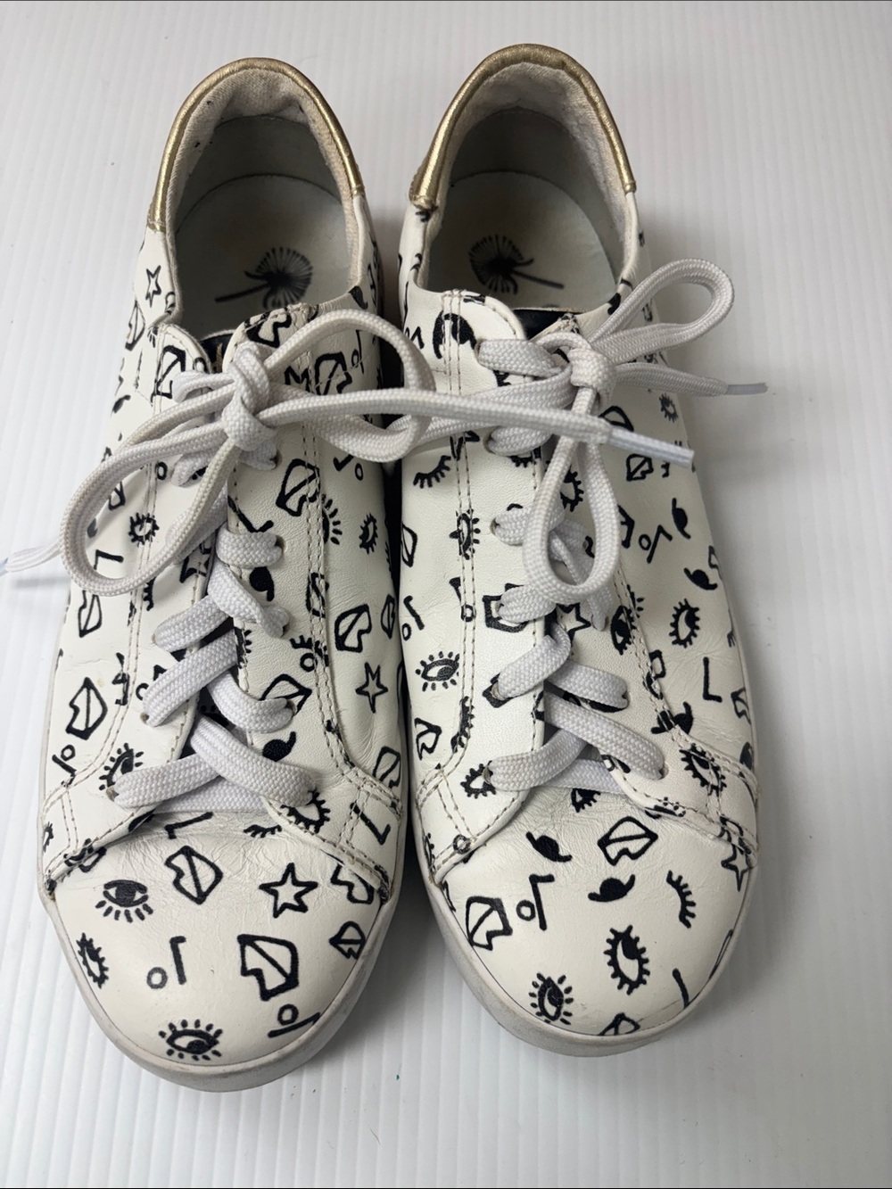 Off the Beaten TrackWhite Women's Graphic Lace-Up Sneakers with Gold Heel Accent
